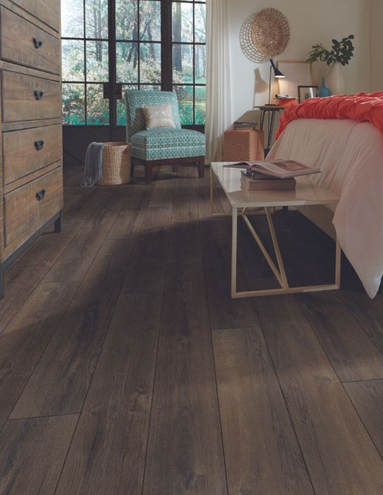 LVP floors in a Marrero, LA, bedroom from Acadian Flooring America
